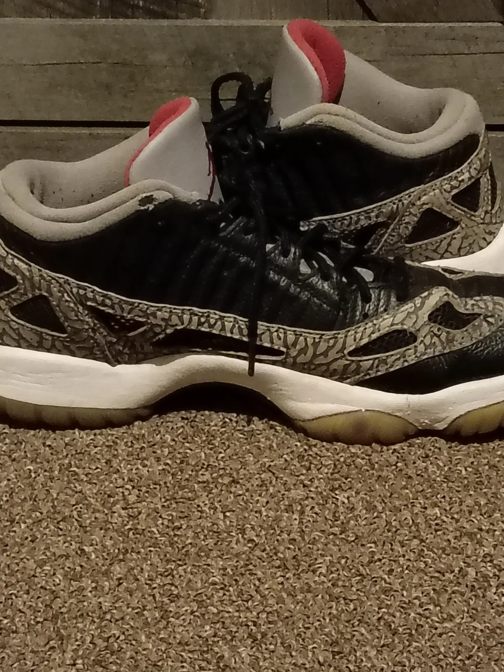 Jordan 11 Retro Low IE sneakers in Black, White and Red